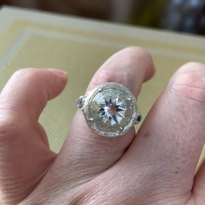 White Topaz ring with small tanzanite accent stones